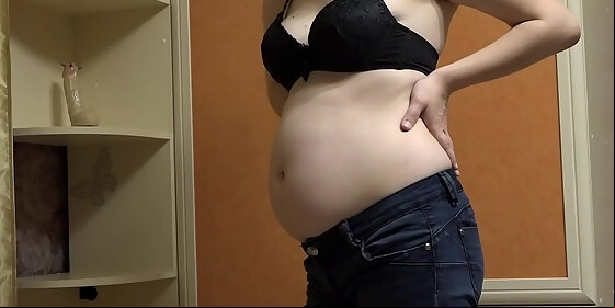 pregnant milf takes off her tight jeans puts on a sexy outfit and masturbates her hairy pussy with a dildo homemade fetish and juicy booty with a h