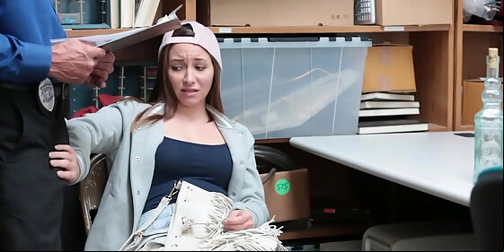 thief was caught on camera stealing a bottle of into her purse