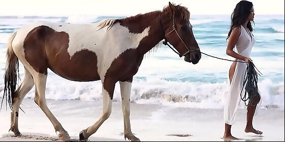 asian beauty putri cinta revealing her tanned pussy on a tropical beach