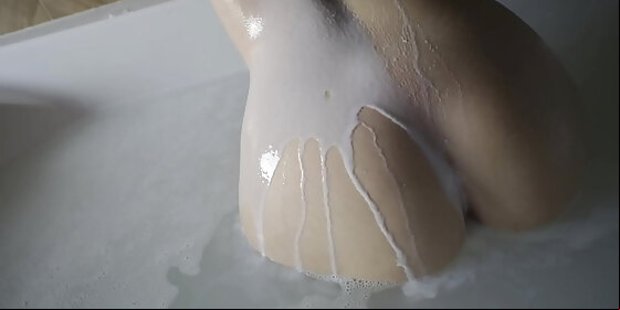 sexy bulgarian babe in the bathtub getting wet