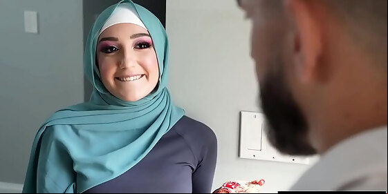 young muslim girl trained by her soccer coach